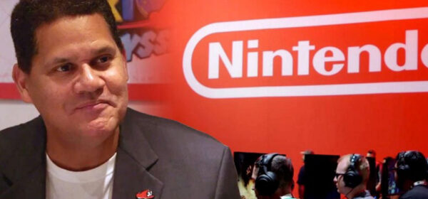 Reggie Fils-Aimé, fond rouge avec logo de Nintendo